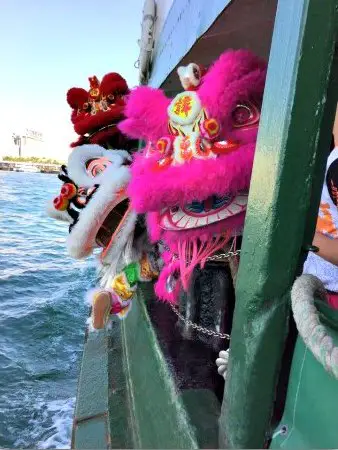 Chinese Lions riding the Star Ferry 