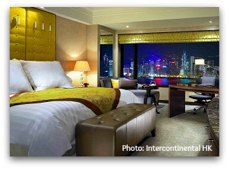 Harbour view room with Convention Center on background at Intercontinental Hotel in Hong Kong at night